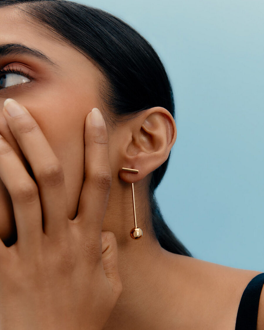 Sparkpick features Cuyana Recycled brass earrings in sustainable fashion
