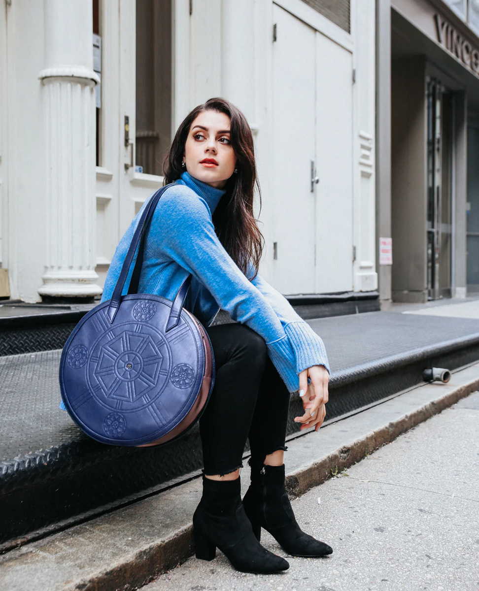 Sparkpick features Gunas circle tote bag from eco PU in sustainable fashion