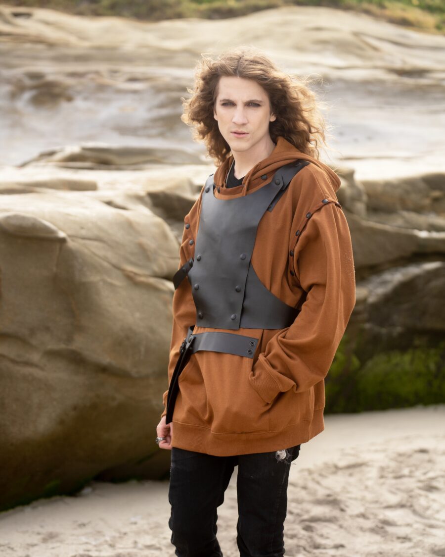 spark rebel features upcycled leather front pin belt for the modular hoodie in sustainable fashion