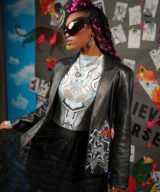 spark and rebel features upcycled leather jacket psychedelic wave print