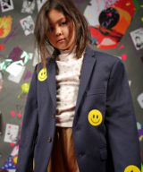 spark and rebel features upcycled ralph lauren school jacket in eco fashion