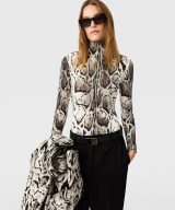 sparkpick features stella mccartney high-neck bodysuit in sustainable fashion