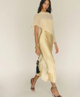 Sparkpick features reformation silk dress in sustainable fashion