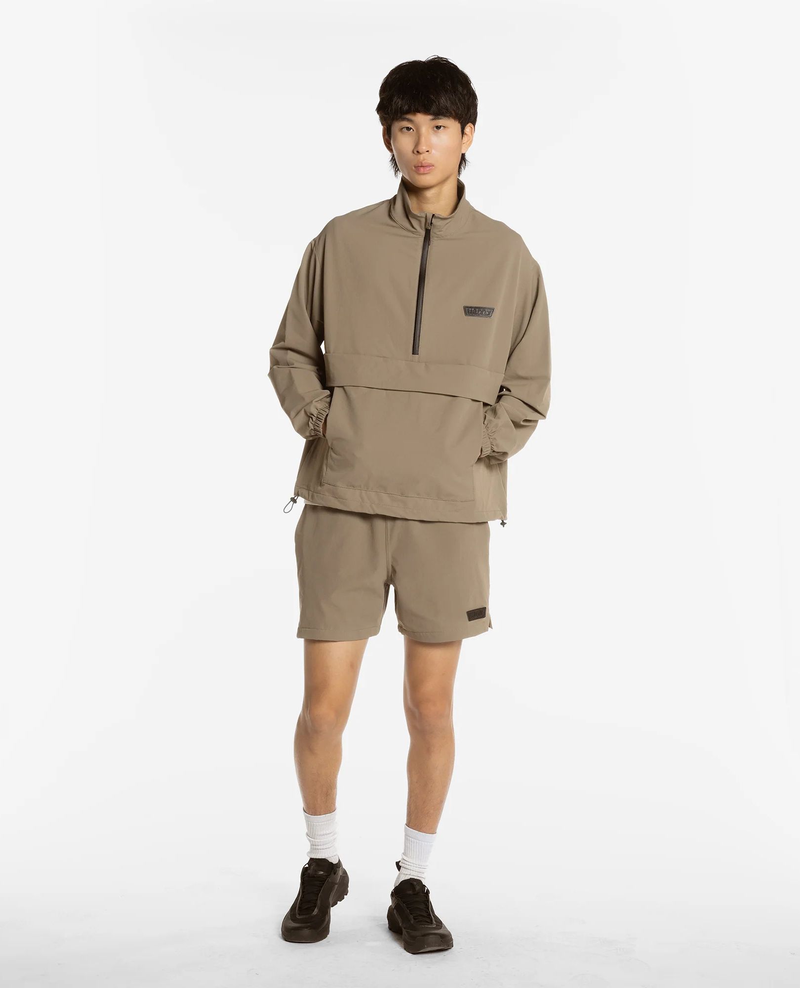 Sparkpick features wuxly movement wildflower windbreaker in sustainable fashion