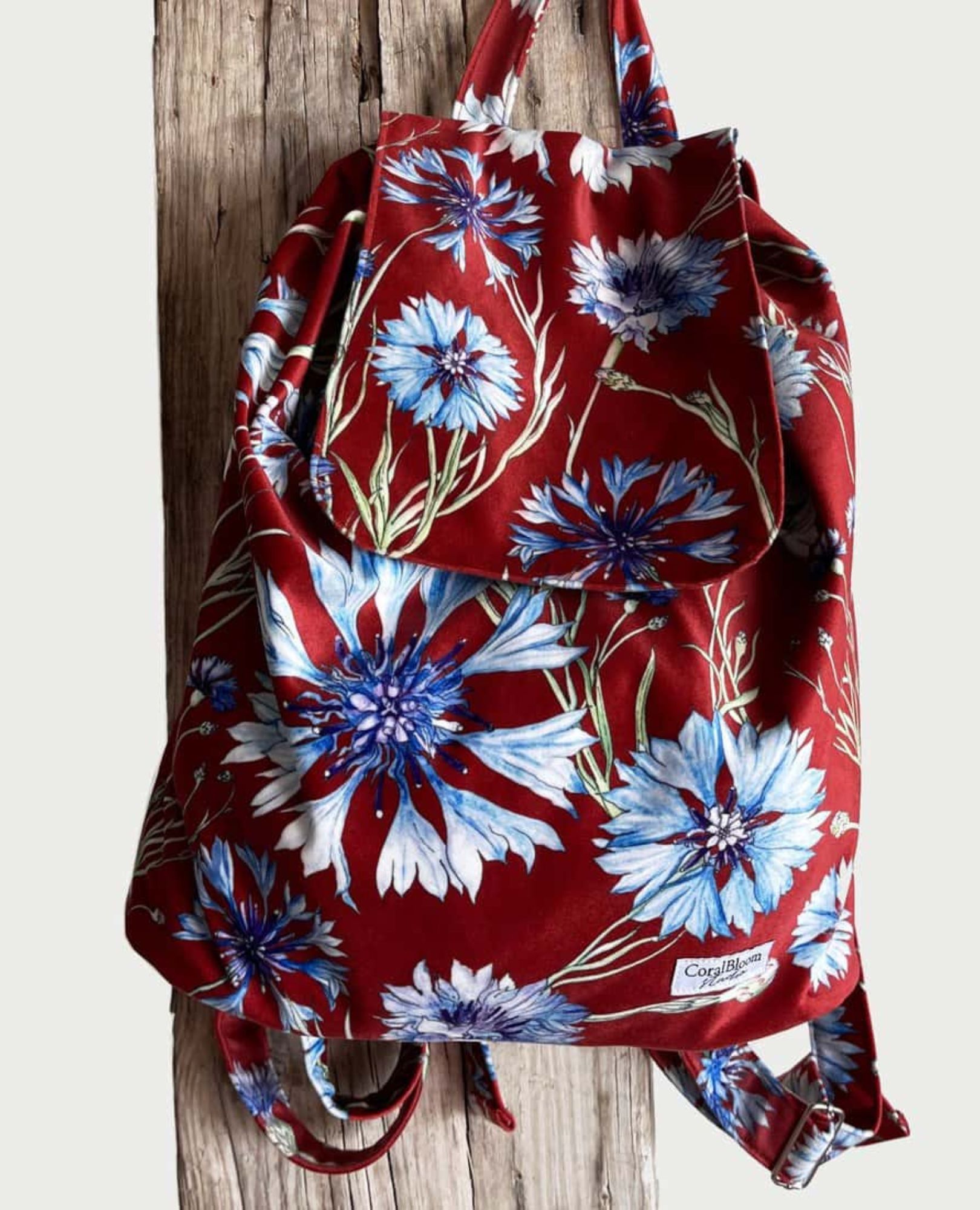 sparkpick features coralbloom flowered backpack in sustainable fashion