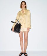 sparkpick features reformation alfie relaxed shirt  in sustainable fashion