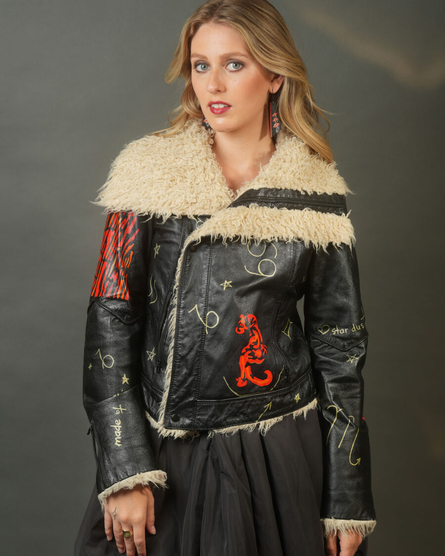 spark and rebel features upcucled leather jacket by racher roy in eco fashion wearable art